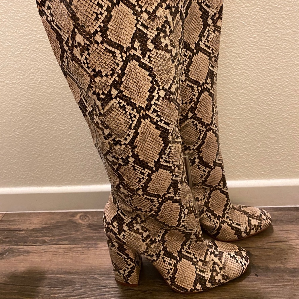 Calf high animal print boots